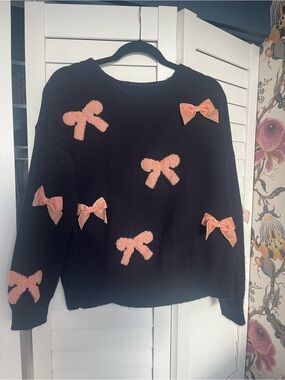 Anthropologie Black Sweater with Pink Bow Appliqués